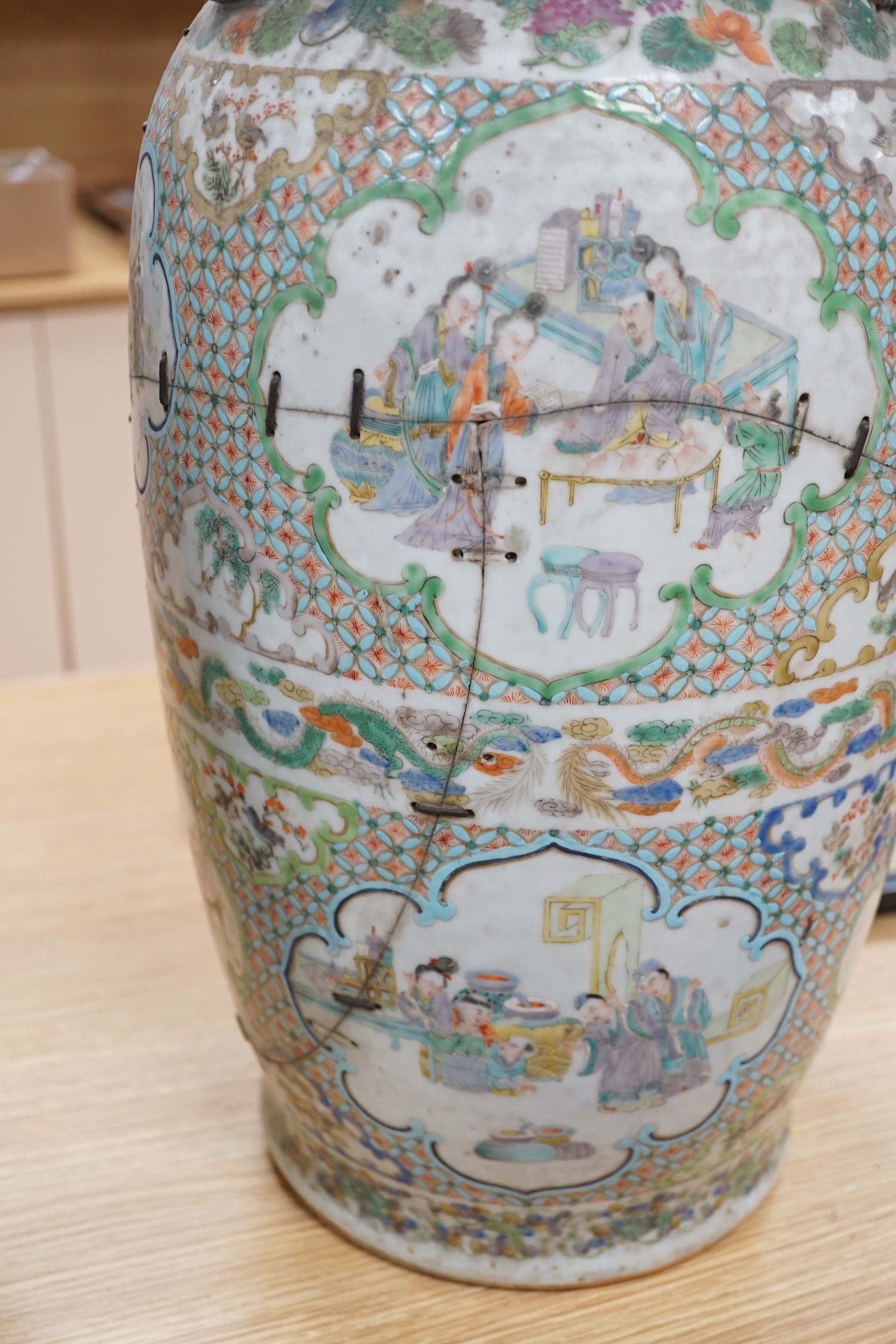 A large pair of Chinese export famille verte dragon vases (in need of restoration), 63cms high